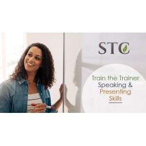 Woman writing on a board beside Train the Trainer Speaking and Presenting Skills course graphic