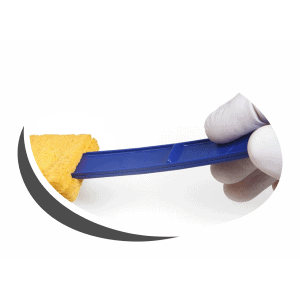 Gloved hand holding a blue swab with yellow sample material