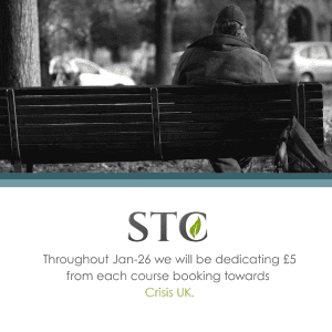 Person sitting on a park bench above a notice about Crisis UK donations in January