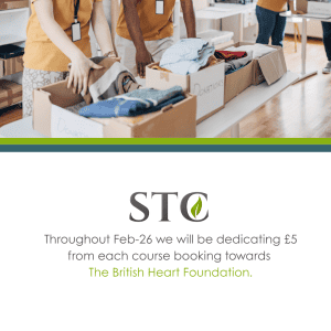 Volunteers sorting donated clothes into boxes with STC fundraising text for the British Heart Foundation