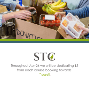 Hands placing tinned food bananas tomatoes and snacks into a donation box for Trussell